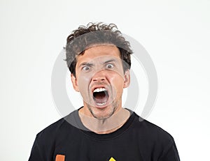 Man in black t-shirt screaming at somebody