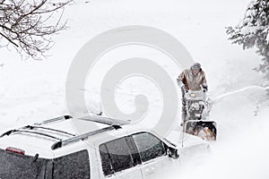 Man blowing out driveway