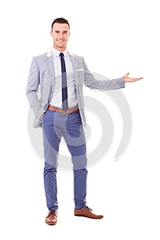 Man in blue blazer showing empty copyspace