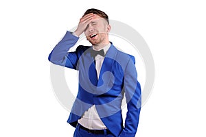 man in blue suite with incredulous face  on white background photo