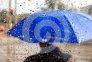 Man With Blue Umbrella