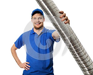 Man in blue uniform with flexible aluminum ducting tube in hand