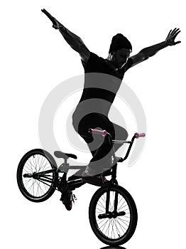 Man bmx acrobatic figure silhouette