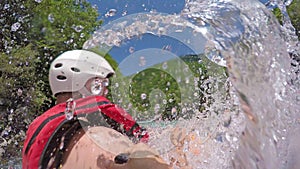 Man in boat enjoy on whitewater rafting