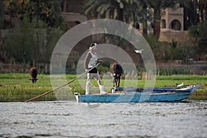 Man with boat in the river