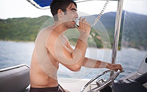 Man, boat and sailing ocean with radio communication or navigation on coastal water or direction, location or voyage