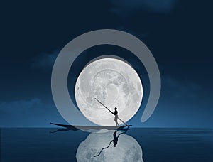 A man in a boat is seen on the water in front of a huge full moon