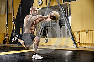 Man bodybuilder perform exercise
