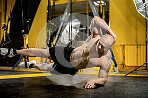 Man bodybuilder perform exercise