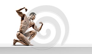 Man - bodybuilder pose on white background