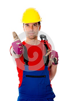 Man with bolt cropper on his shoulder and thumb up