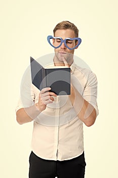 Man with book. Study hard. Self improvement literature. University student with lecture notes. Teacher funny guy. Male