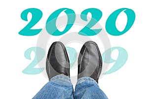 Man in boots and 2020 new year