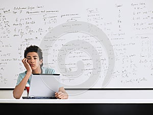 Man Bored With Laptop In Classroom