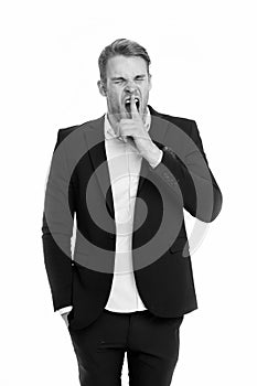 Man bored yawning white background. Fed up with this. Man dislike boring formal rules at workplace. Guy wears boring