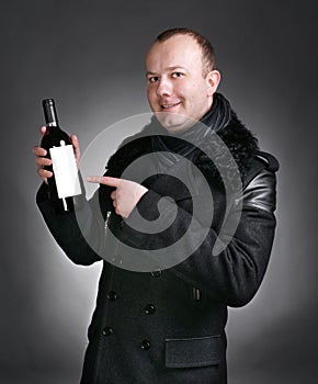 Man with bottle of wine