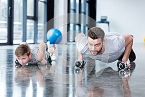 Man and boy doing push ups