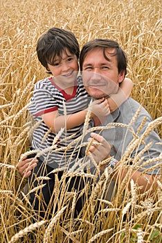 The man with boy on field