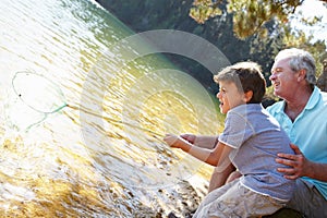 Man and boy fishing together