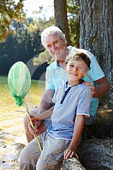 Man and boy fishing together