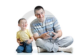 Man and boy play with a playstation together