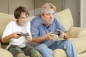 Man and Boy Play Video Games