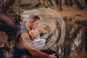 Man and boy tourists autumn time leisure, vacation hiking or traveling touristic activity.