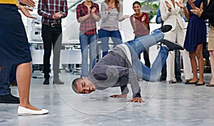 Man, breakdance and office with people for creative company, salary bonus and team building. Happy employees, business