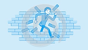 Man breaking the brick wall