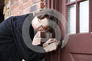 Man breaking into home photo