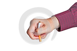 Man breaks a cigarette