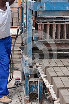 Man and bricks machine