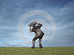 Man with briefcase over head