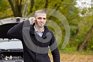 Man with a broken car