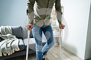 Man With Broken Leg Walking On Carpet