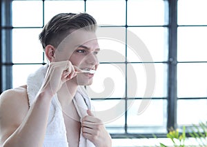 Man brushing teeth