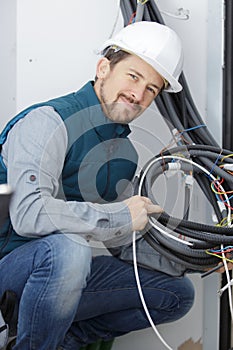 man builder hands holding metal wires
