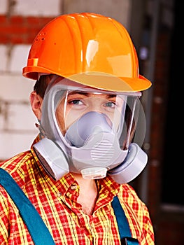 Man in builder respirator. photo