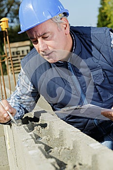 man builder working with cement