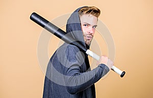Man bully guy with baseball bat. Strong and confident. Self defence. Sport equipment. Sportsman strong looks threatening