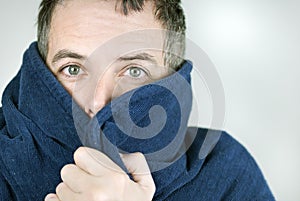 Man Bundled Up In Housecoat