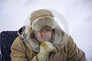 Man bundled up in sub zero winter weather