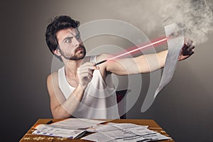 Man burning bill with laser