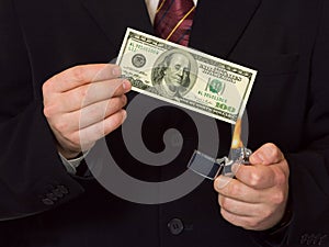 Man burnning the money photo