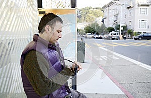 Man at a bus stop