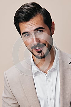 man business businessman portrait handsome happy young beige copyspace smiling suit