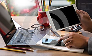 Man of business laptop  man hand working on laptop computer on wooden desk Laptop with blank screen on table compute screen mockup