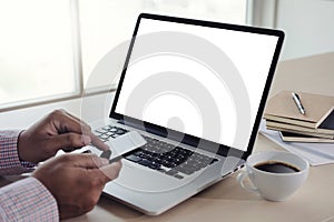 man of business man hand working on laptop computer blank white