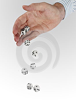 Man in business shirt with tumbling dice