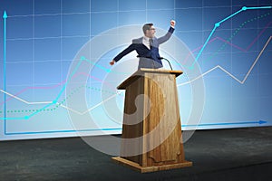 The man businessman making speech at rostrum in business concept